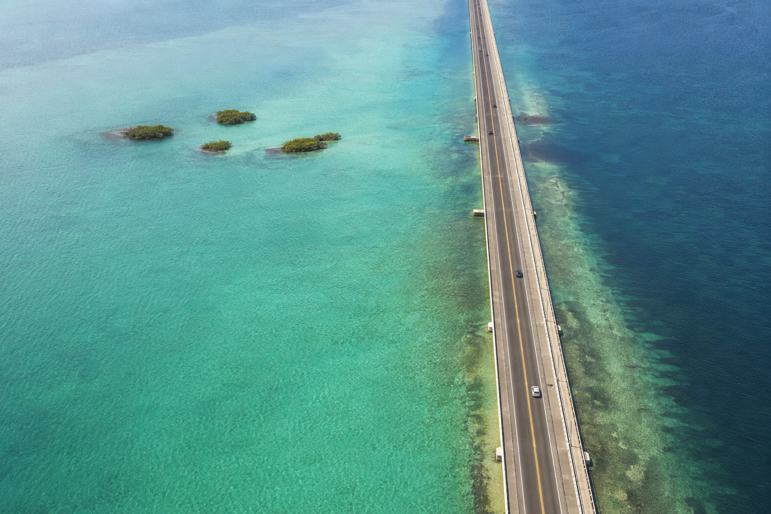 Conceptual aerial view of a Florida causeway between turquoise and deep blue water